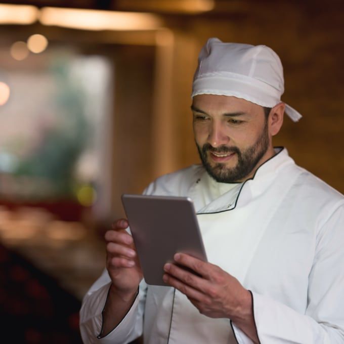 Chef holding a tablet